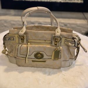 Authentic - Well loved Coach purse. Signs of use.